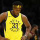 Illustration for article titled Myles Turner, Professional Athlete, Is No Longer Eating Eight Slices Of Pizza At Once